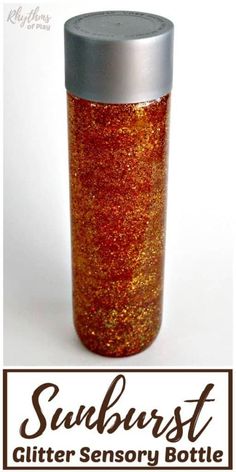 This DIY glitter sensory bottle recipe video tutorial provides an easy way to calm an overwhelmed or anxious child. Give this gorgeous glittering sunburst glitter sensory bottle a shake to see it swirl, sparkle, and SHINE to cheer your children up and put a smile on their face just like the sunshine on a sunny day! | Rhythms of Play